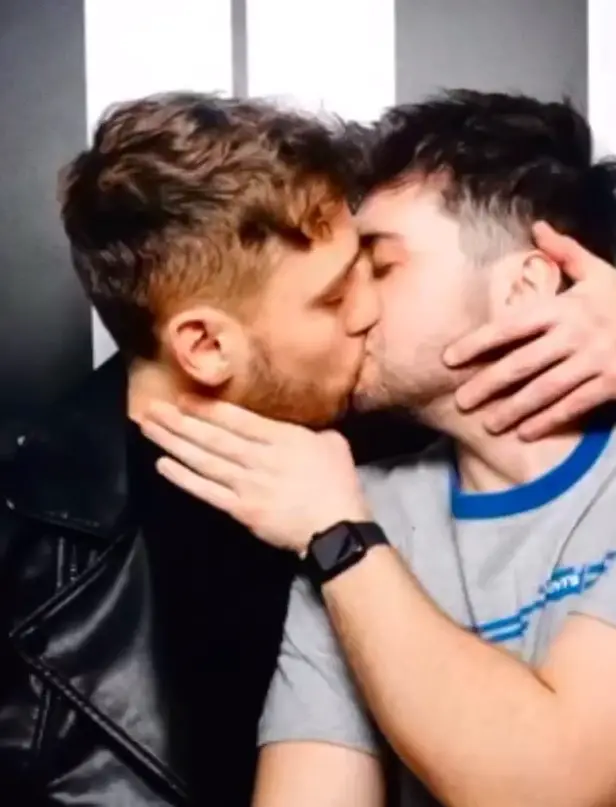 Sacha Ferrer kissing his boyfriend