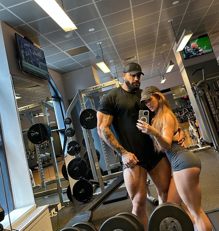 Lucas Lakutsin with his girlfriend working out together in the gym