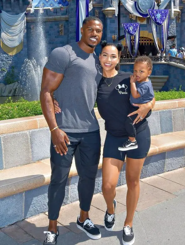 Simeon Panda with his wife and a son