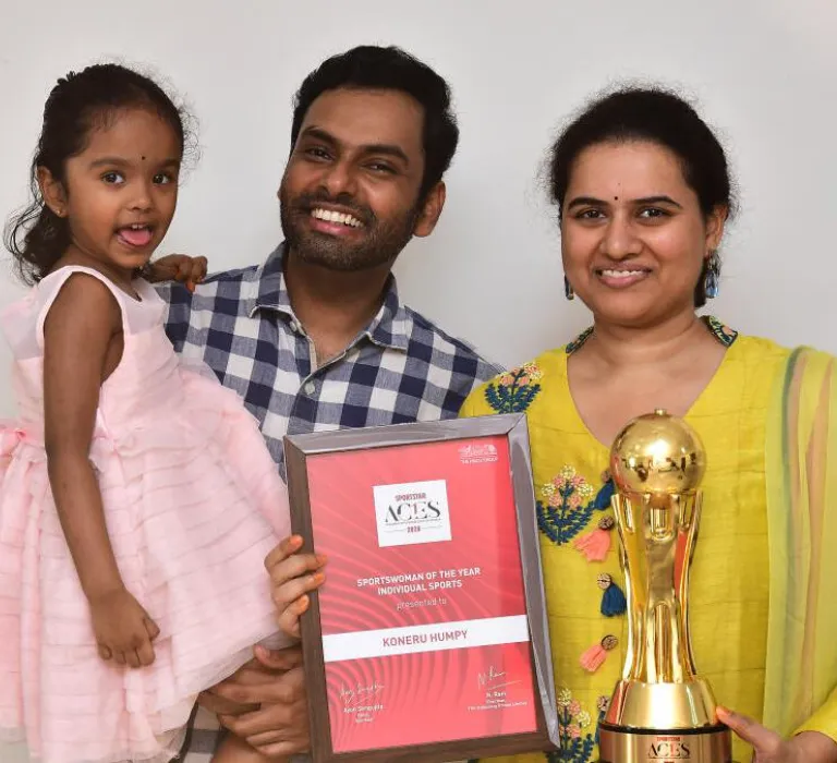 Indian Chess GM Koneru With Her Husband, And Daughter