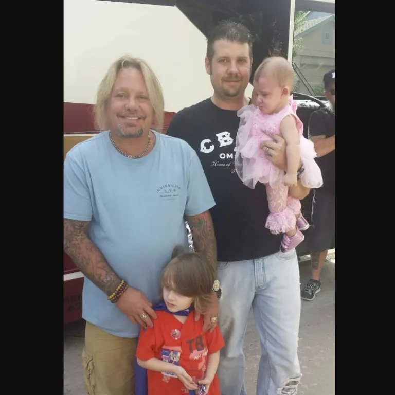 Vince Neil with his son and grandchildren